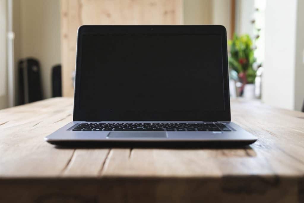 HP laptop on table at home