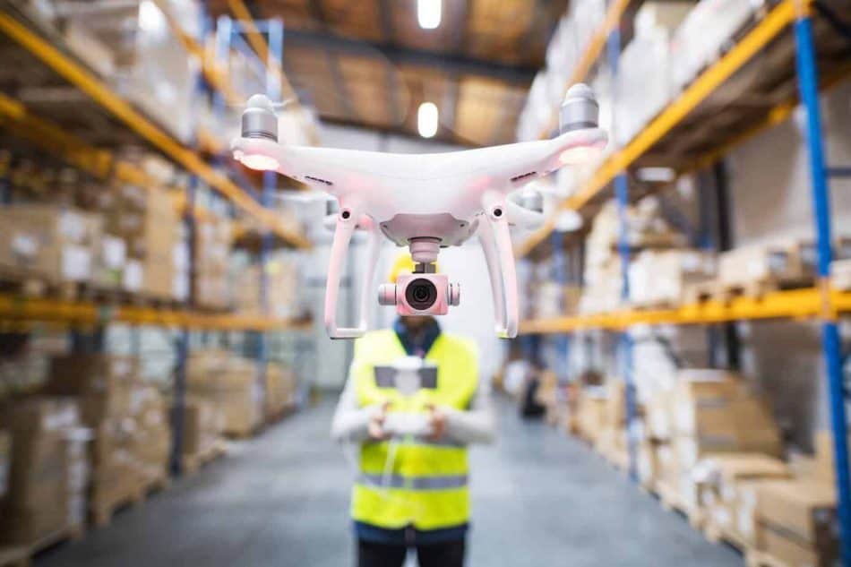 man-with-drone-in-a-warehouse