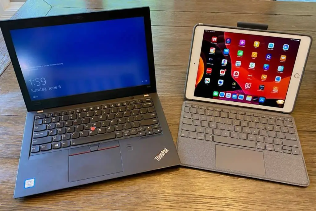 thinkpad laptop next to ipad