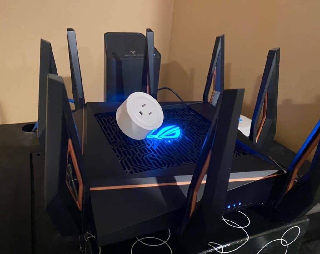 Asus Router With Smart Plug on It