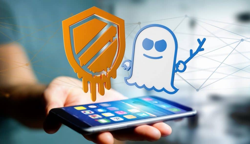 Businessman using a smartphone with a Meltdown and Spectre proce