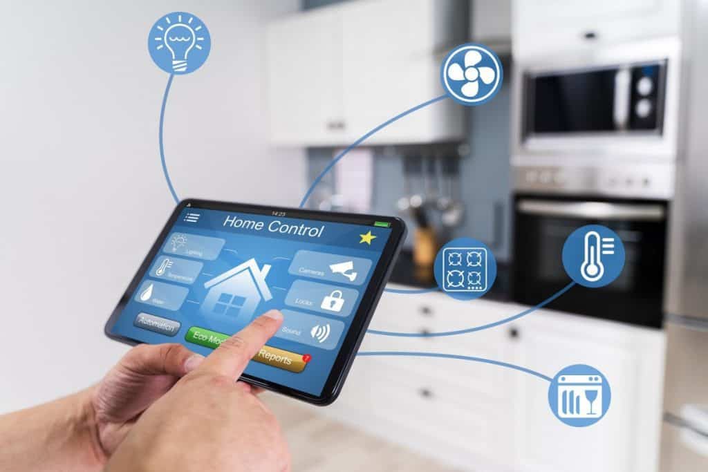 Person Using Smart Home Application On Smartphone