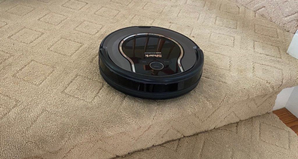 robot vacuum on carpet stairs
