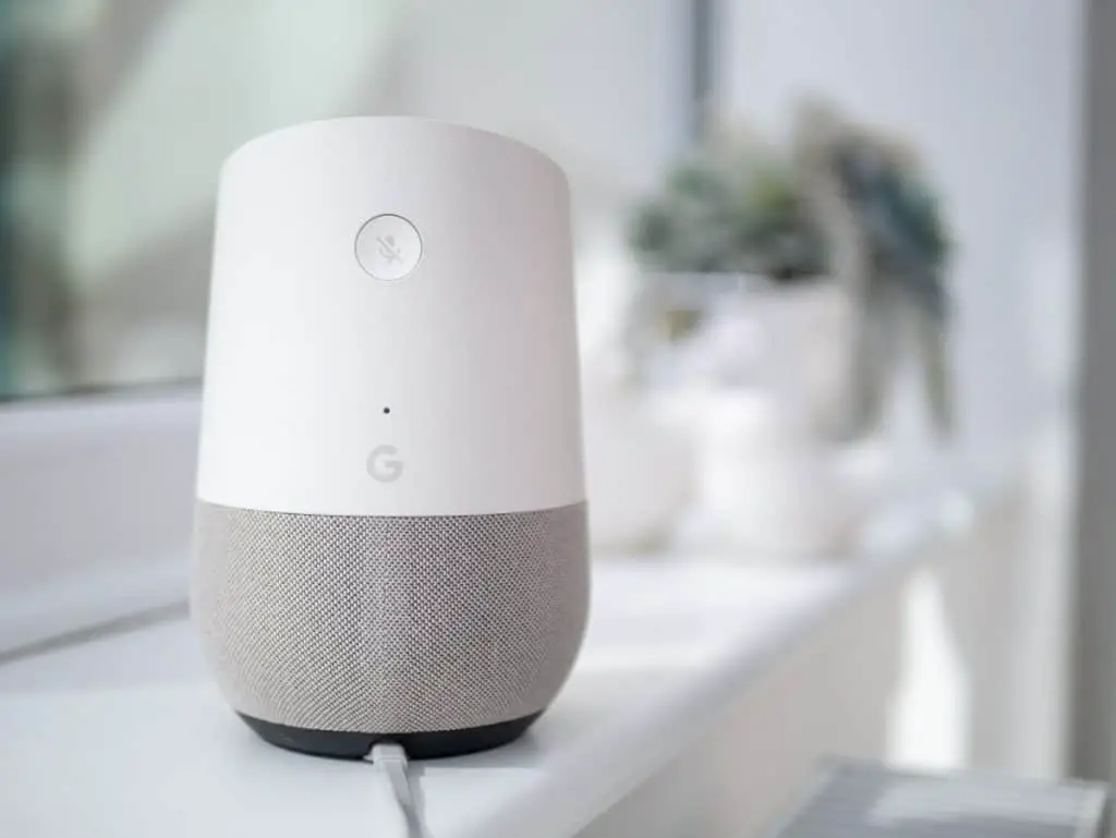 Google home smart speaker on windowsill